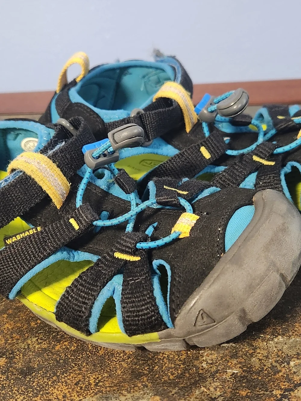 KEEN Kids Black and Blue Closed-Toe CNX Sandals
